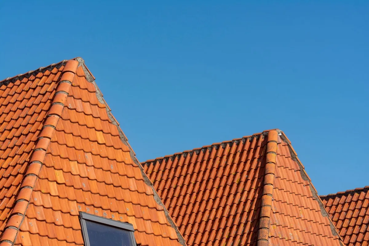 Clay barrel tile rooflines on homes in Pasadena, TX