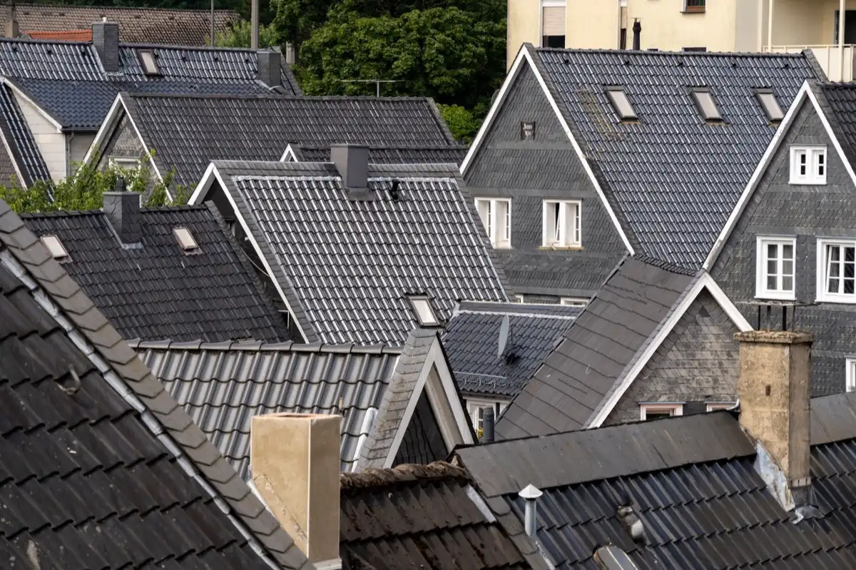Steep roof eaves and gutter lines on houses in Pasadena, TX