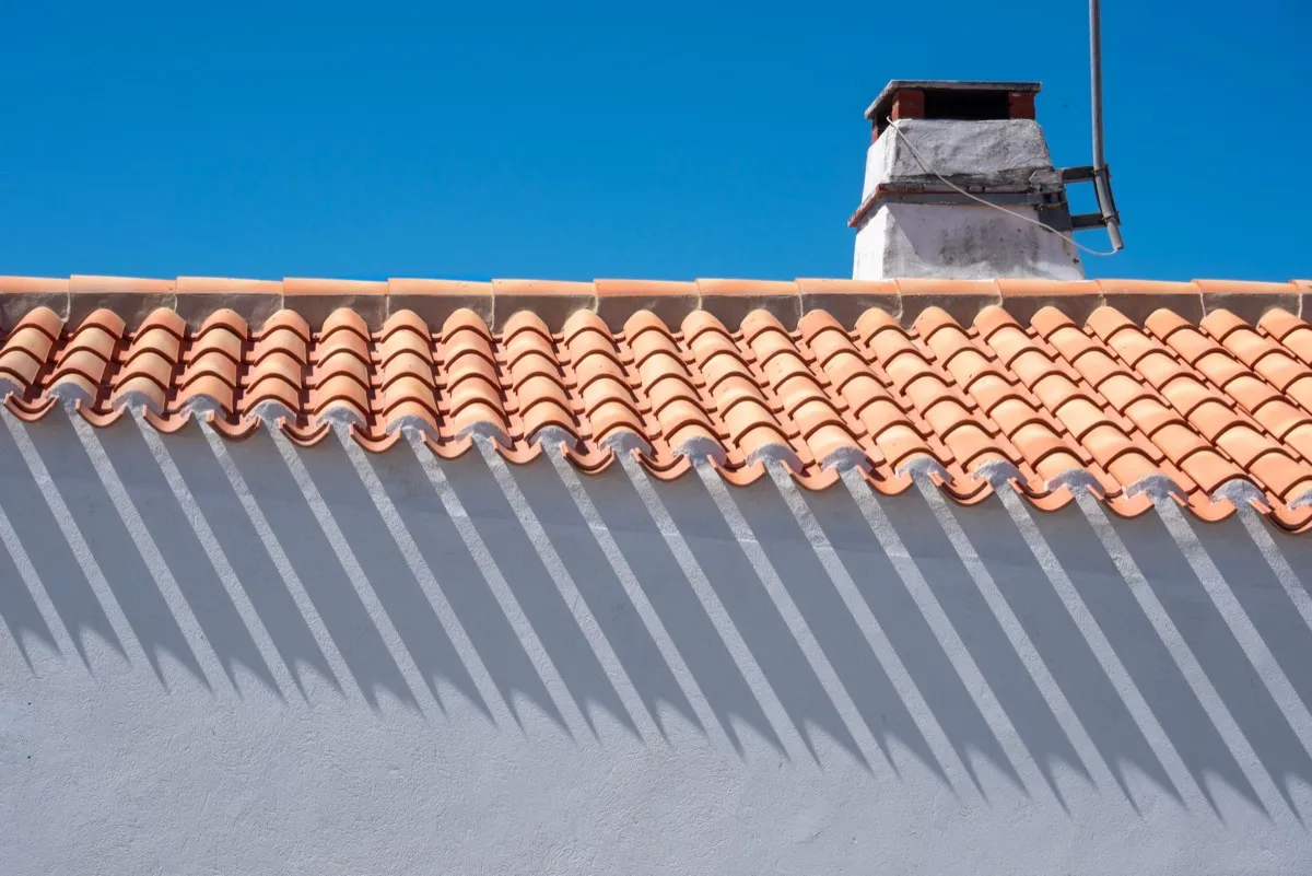 Roof ridge line and chimney on a home in Pasadena, TX